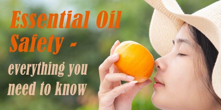 woman smelling an orange