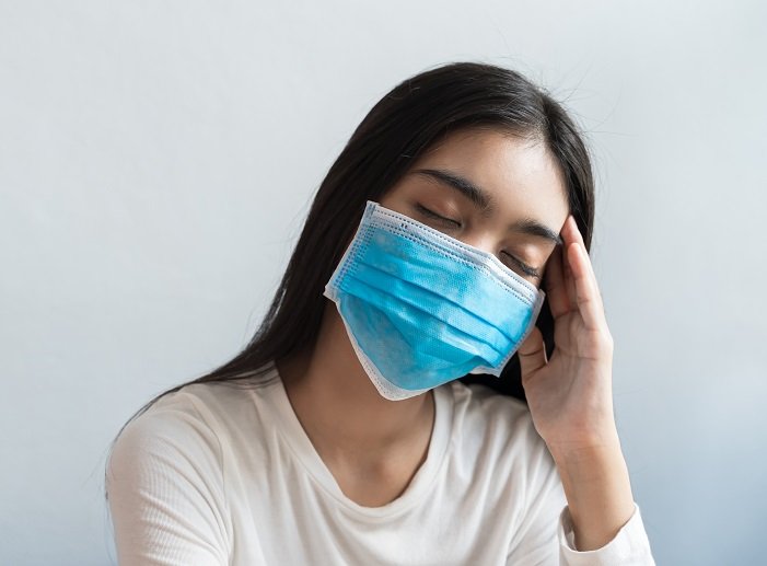 woman wearing a mask