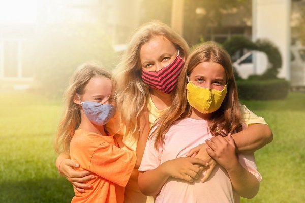 family wearing masks