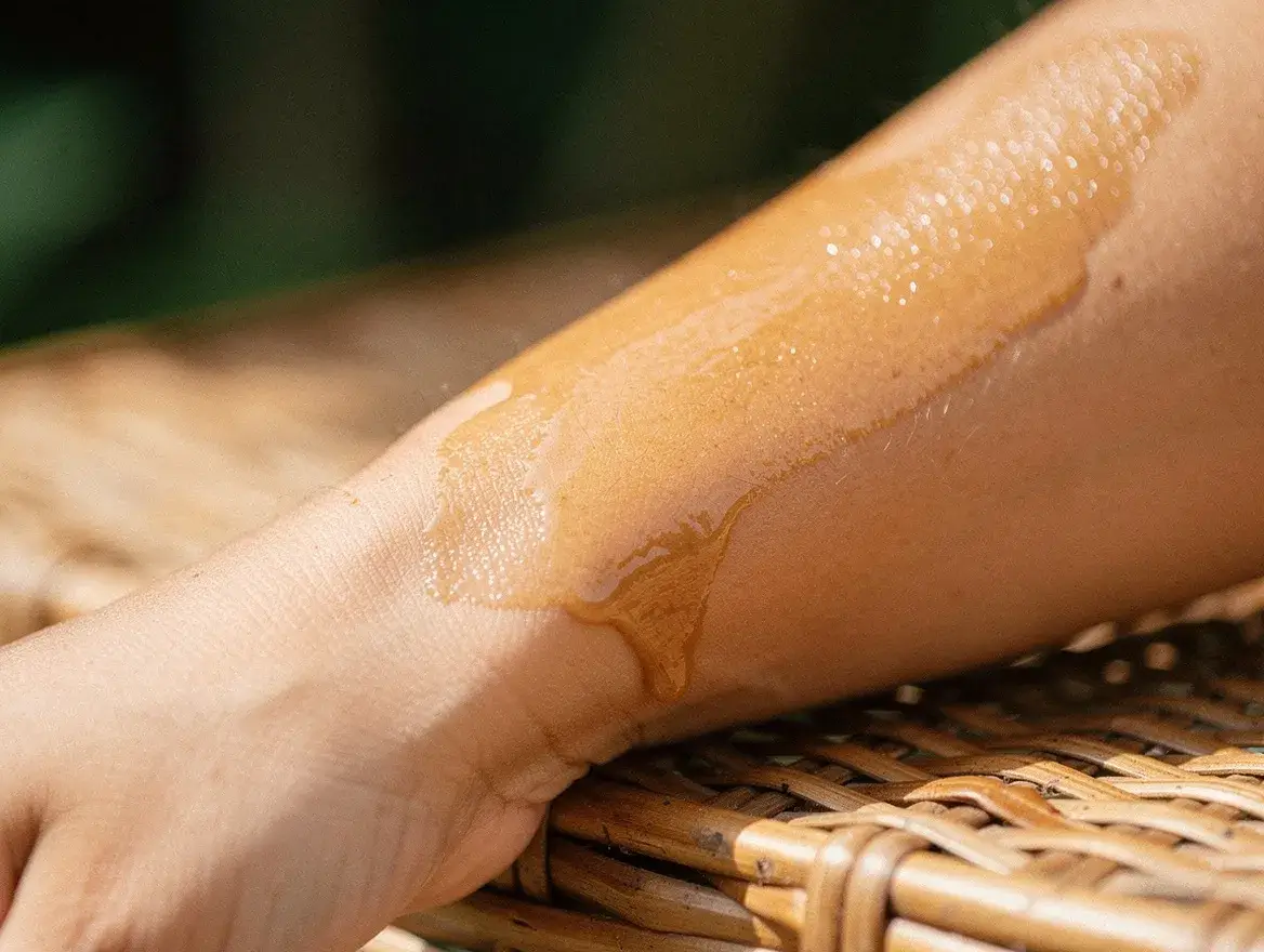 botanical oil absorbing into skin to support elasticity and comfort