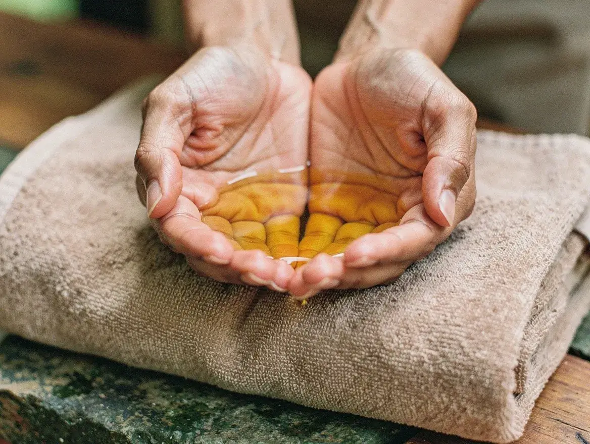 the daily massage ritual of applying a natural stretch mark oil