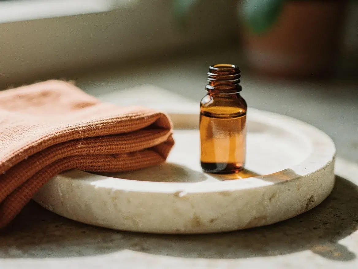botanical oil and warm cloth for oil cleansing