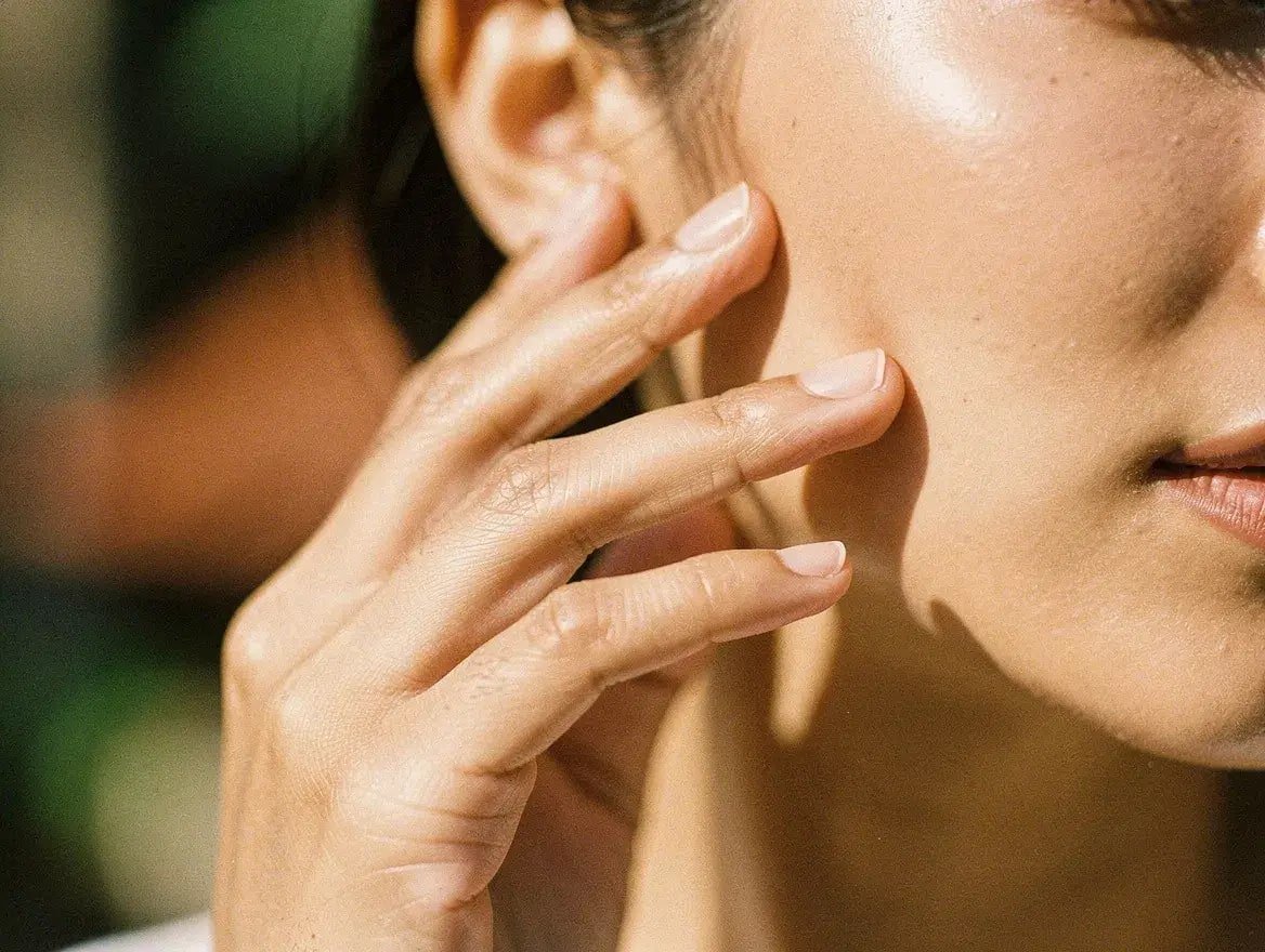 applying face oil to different skin types for moisture balance